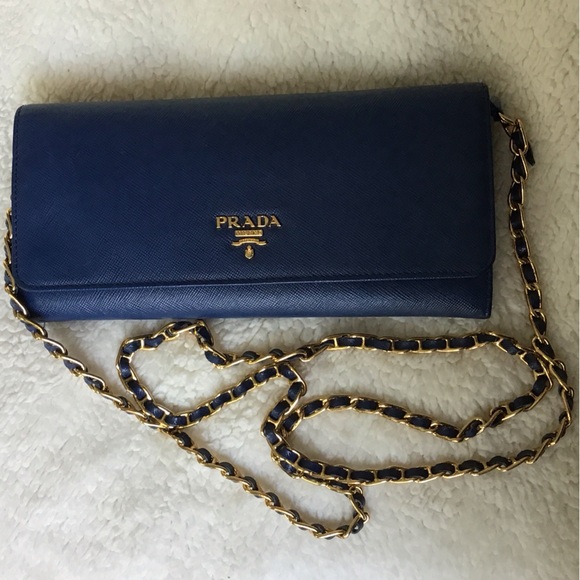 Prada Handbags - Prada Navy Leather Clutch with Gold Chain